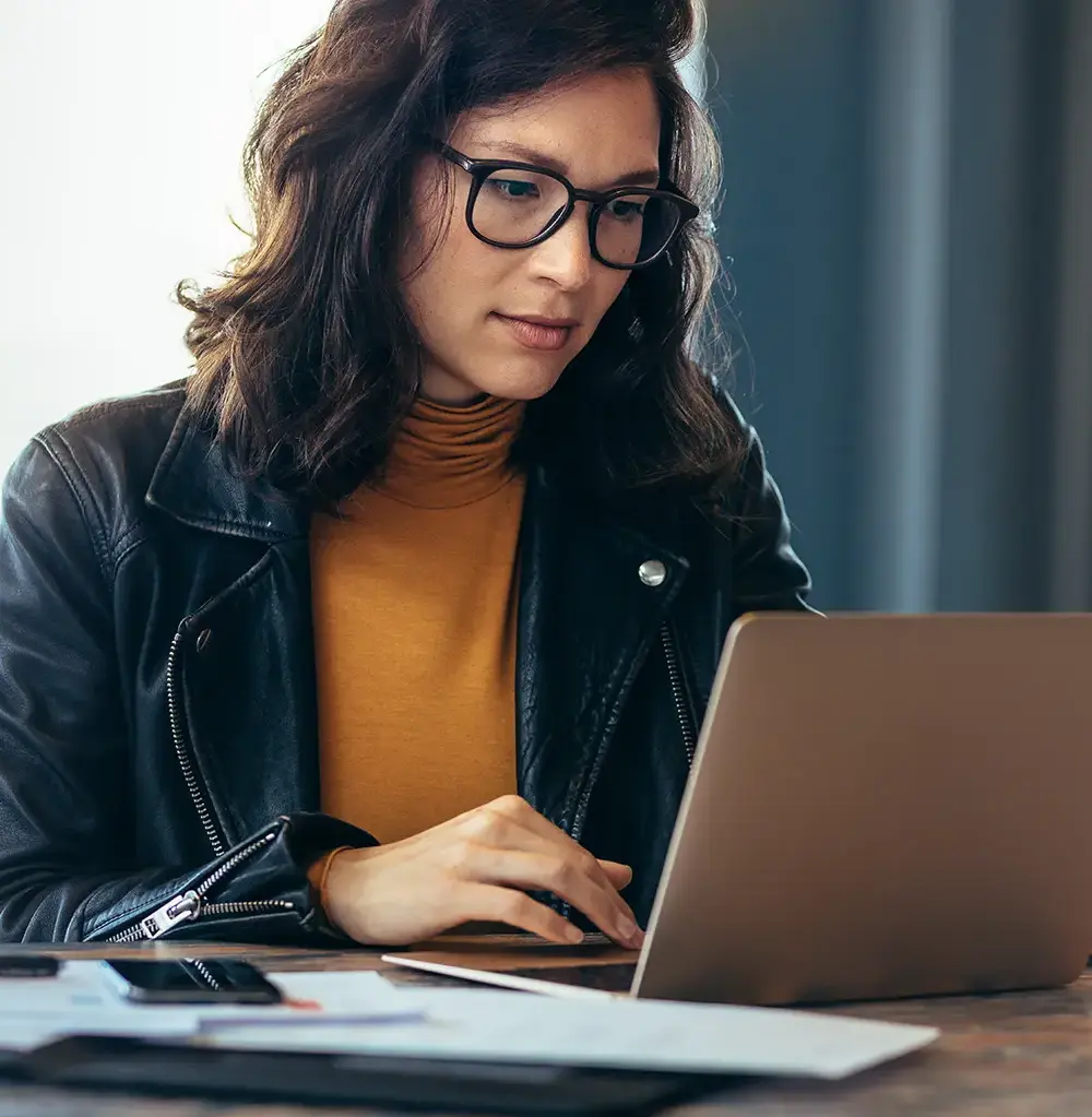 Asian woman working laptop at office