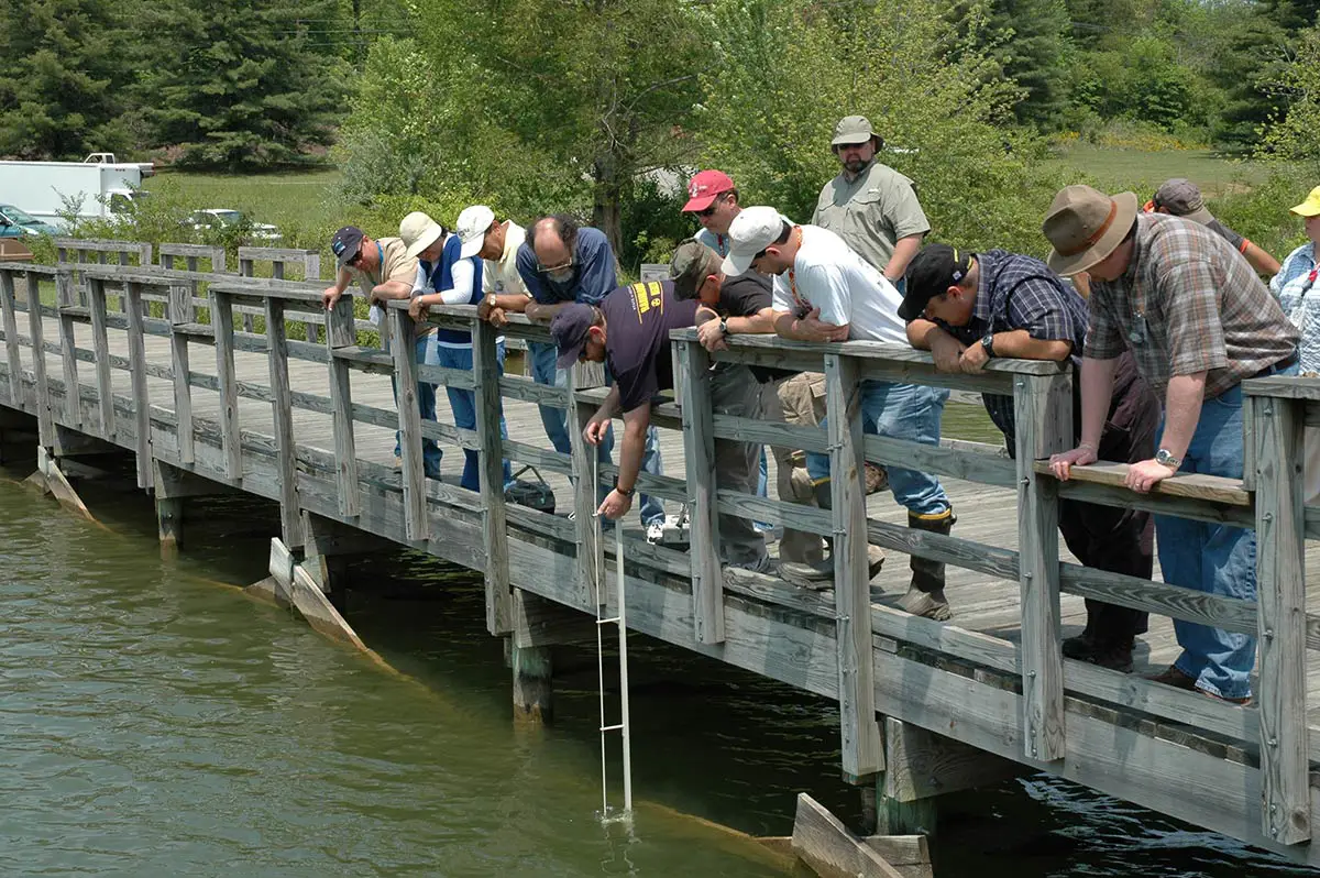 Environmental Monitoring Course instructor and students in the field