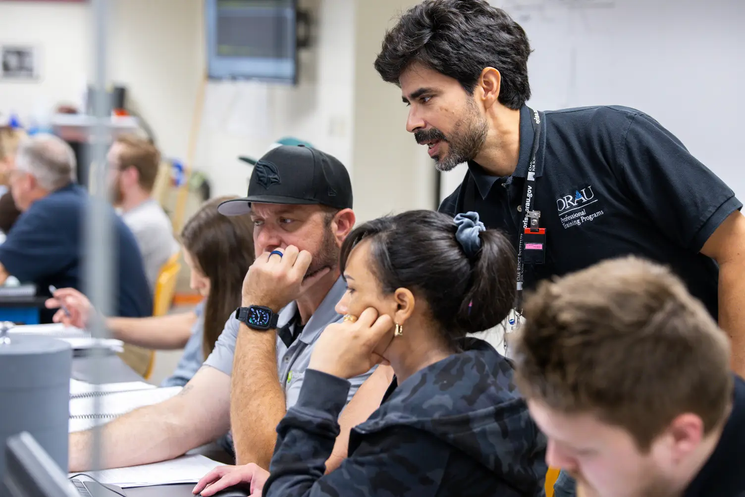 Gamma Spectroscopy Course instructor and students in classroom