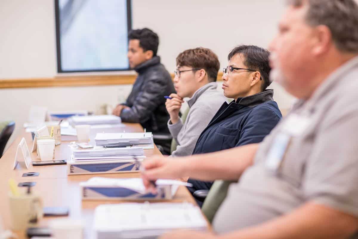 Students listen to the instructor during the MARSAME course