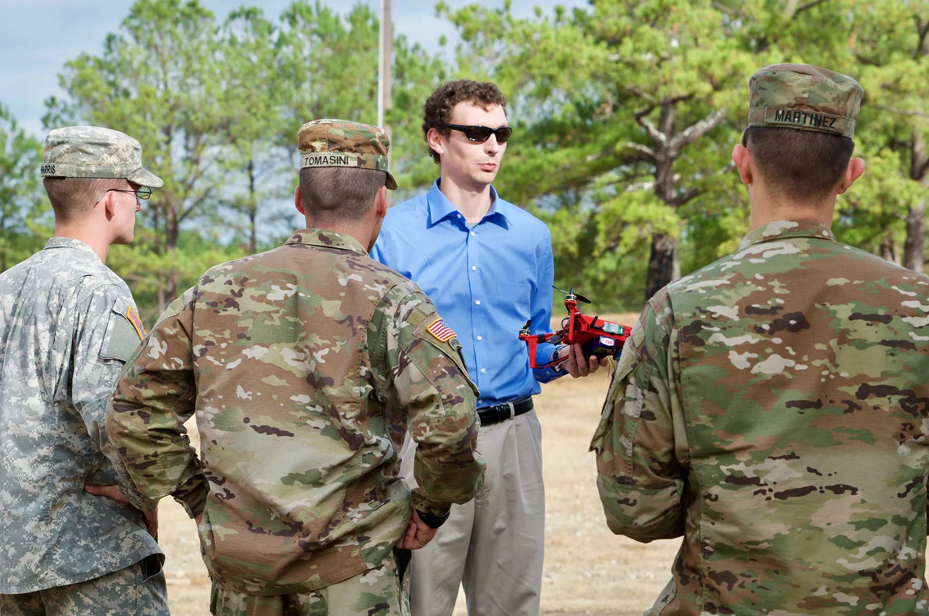A participant explains his research with the U.S. Army Research Laboratory