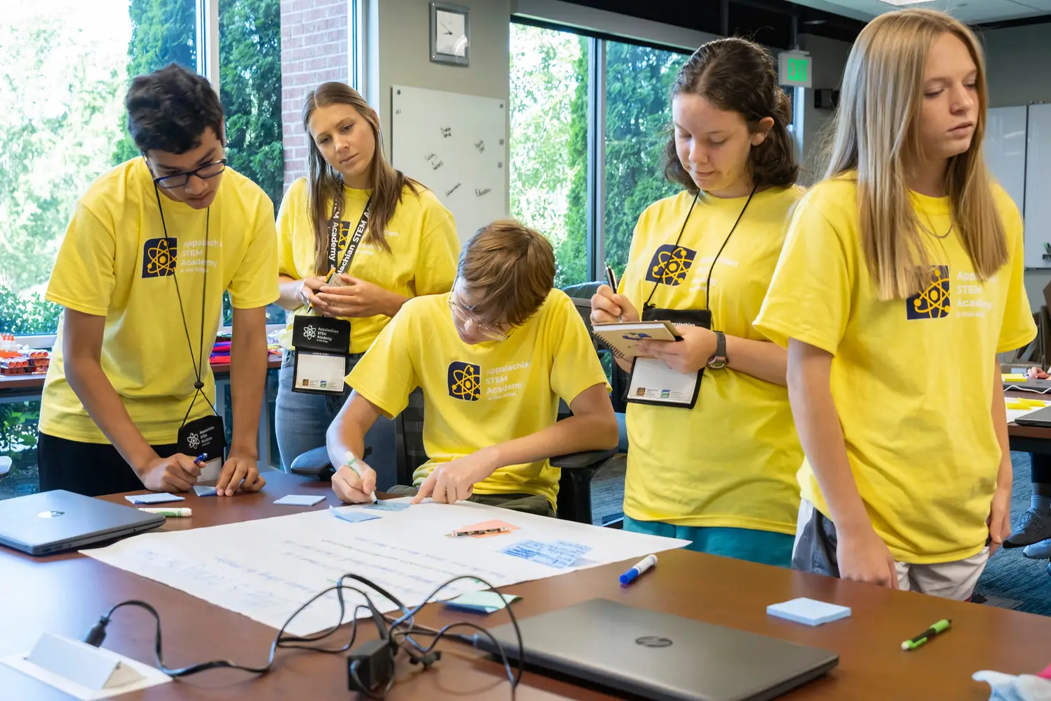 Students works on a city planning research project during the Appalachian STEM Academy