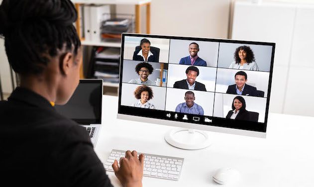 A woman participates in a virtual meeting