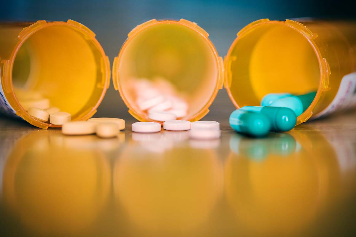 Three prescription pill bottles