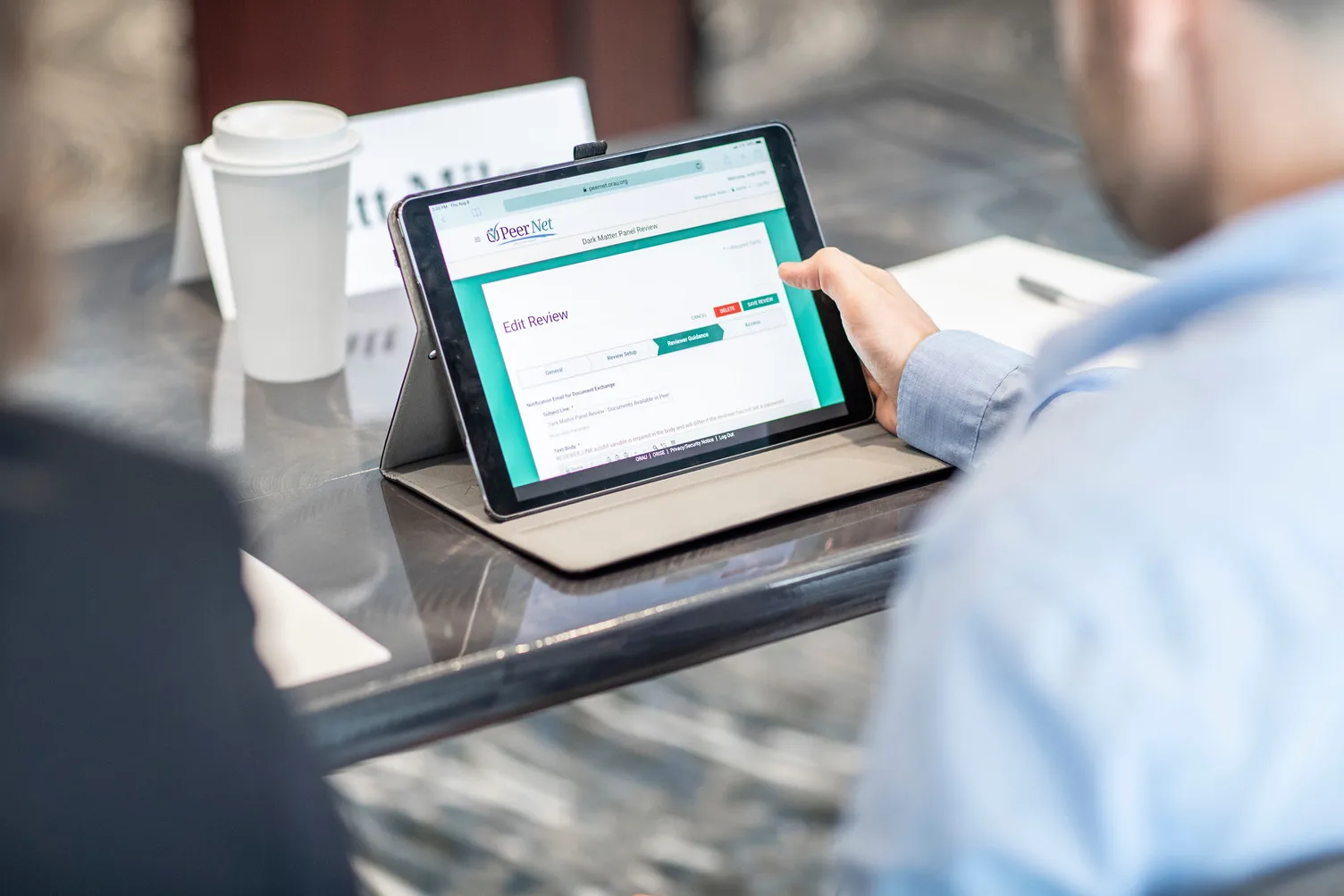 A man uses PeerNet on a mobile device