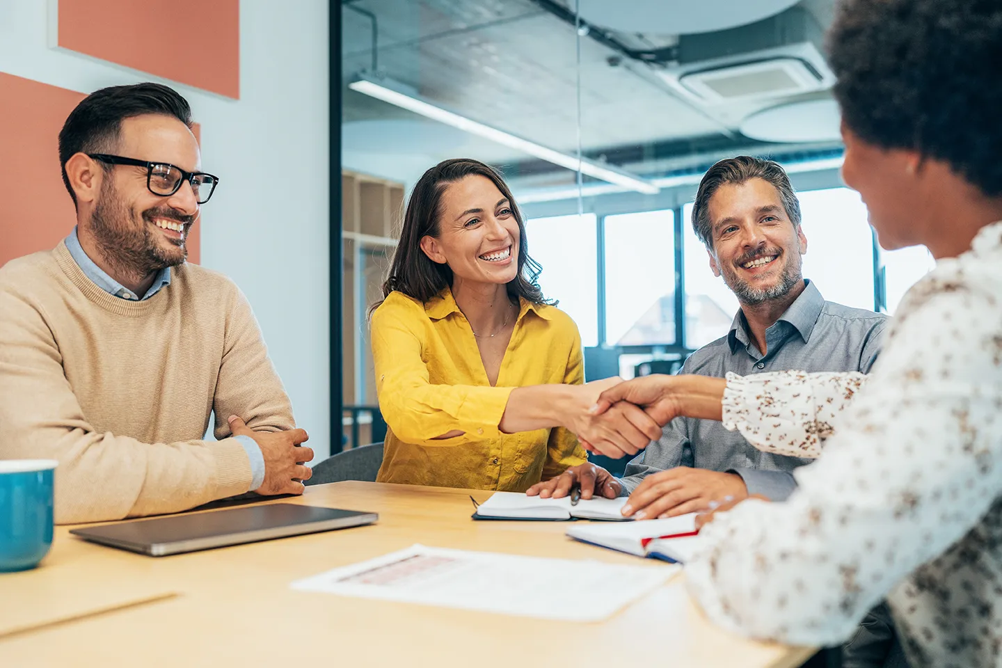 Coworkers meet and greet together during a job interview